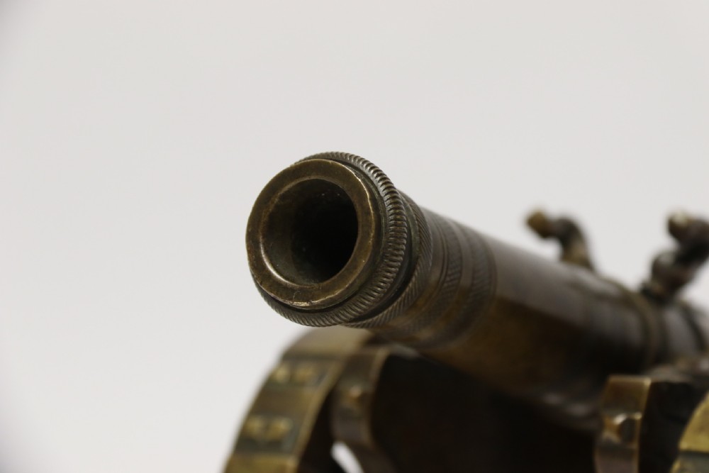 A 19th century French bronze model cannon. View XIV