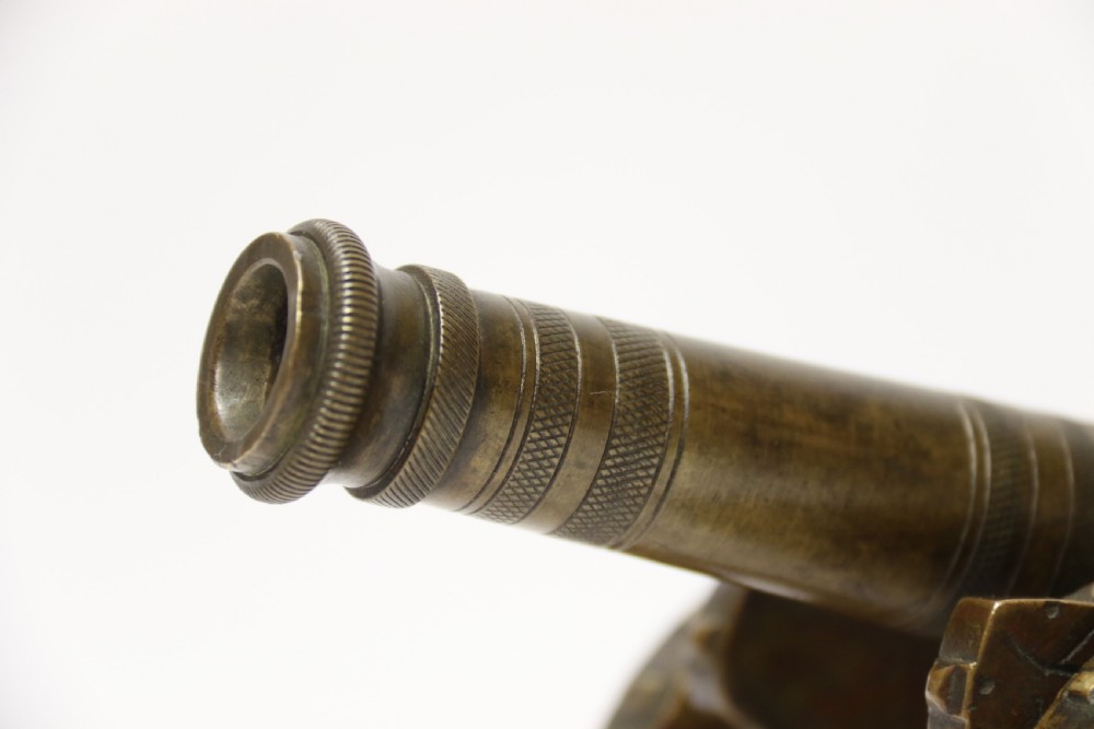 A 19th century French bronze model cannon. View XVIII