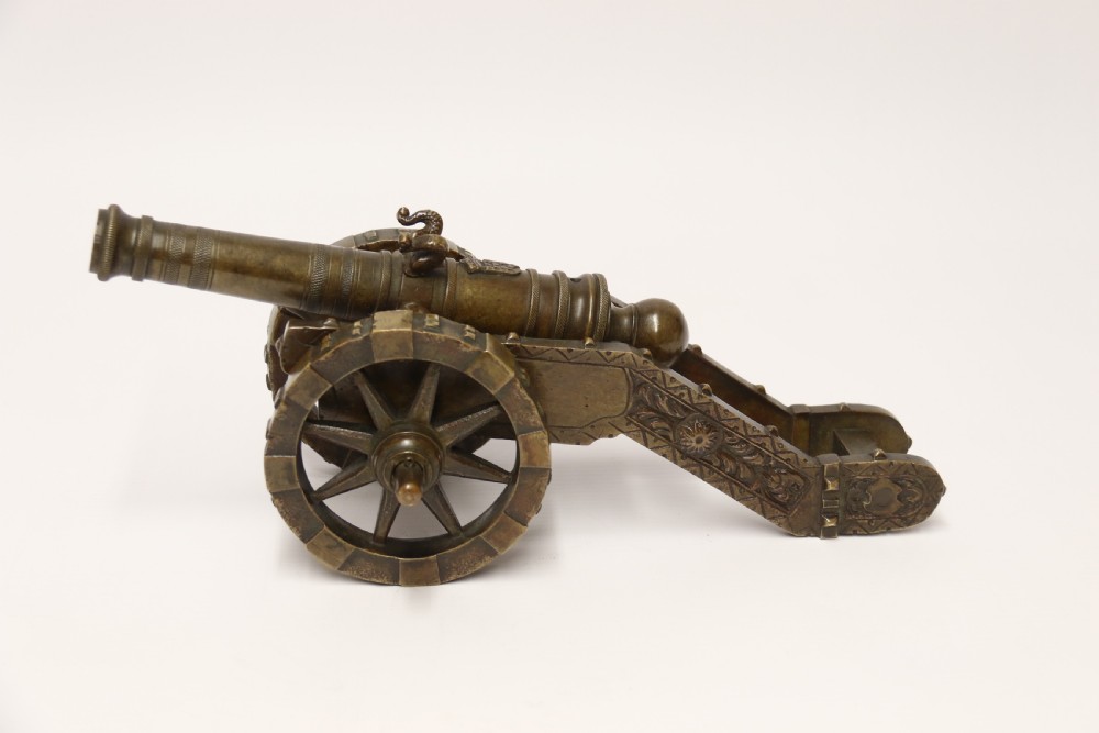 A 19th century French bronze model cannon. View XXI