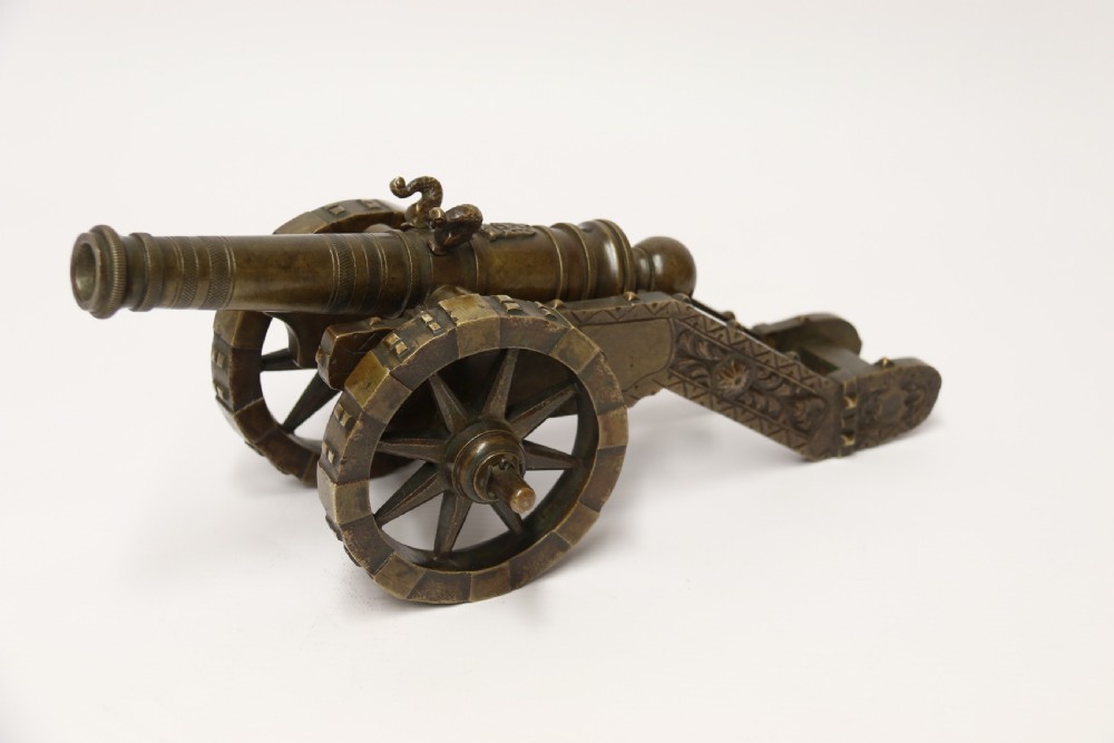 A 19th century French bronze model cannon. View XXII