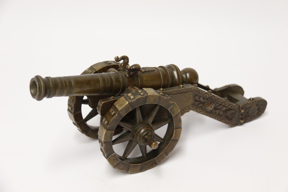 A 19th century French bronze model cannon. View XXIII