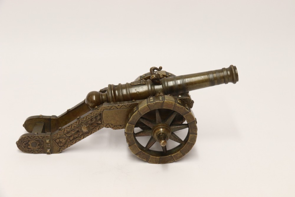 A 19th century French bronze model cannon. View XXV