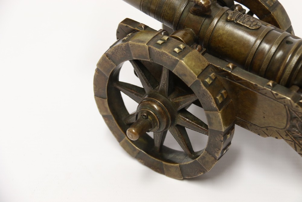 A 19th century French bronze model cannon. View XXX