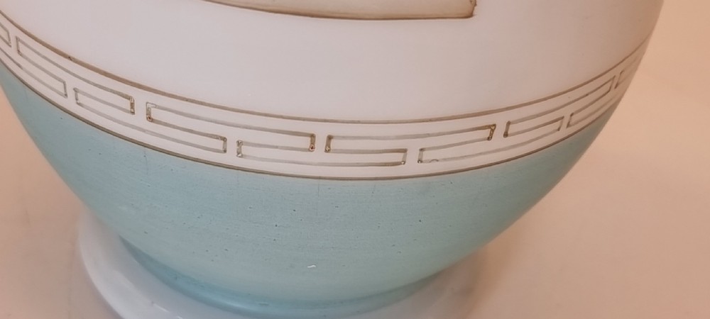 A late nineteenth-century opaque white and light blue glass vase decorated with a hand-painted scene of a Greek chariot and warrior bordered by Greek key patterns. View XII