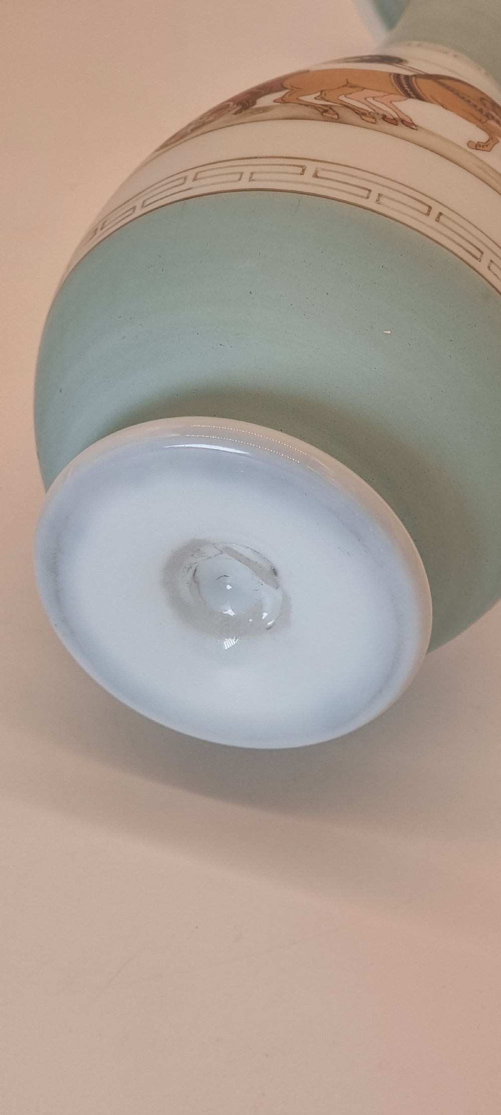 A late nineteenth-century opaque white and light blue glass vase decorated with a hand-painted scene of a Greek chariot and warrior bordered by Greek key patterns. View XV