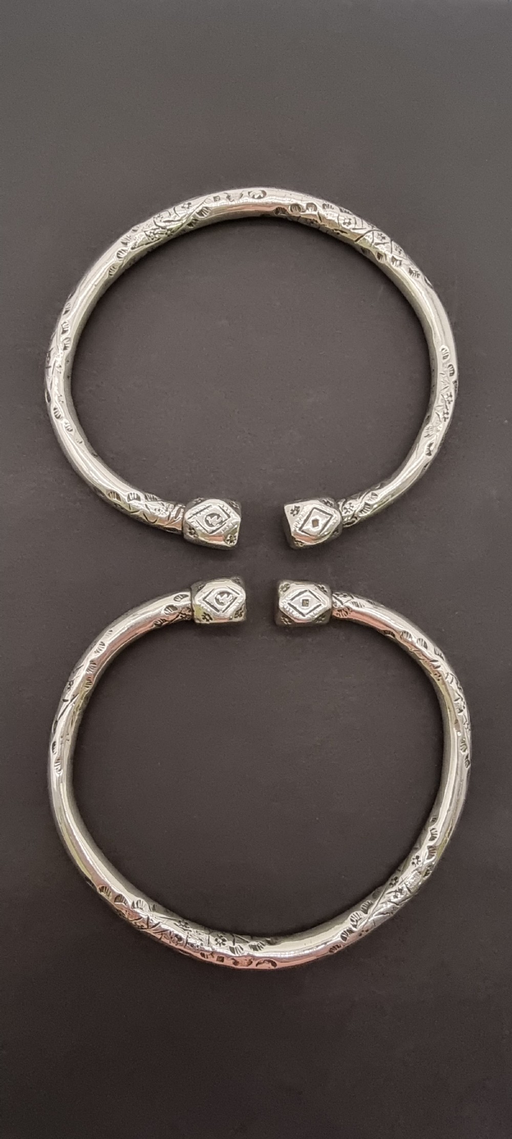 A very heavy pair of 19th century Portuguese solid silver arm bracelets


