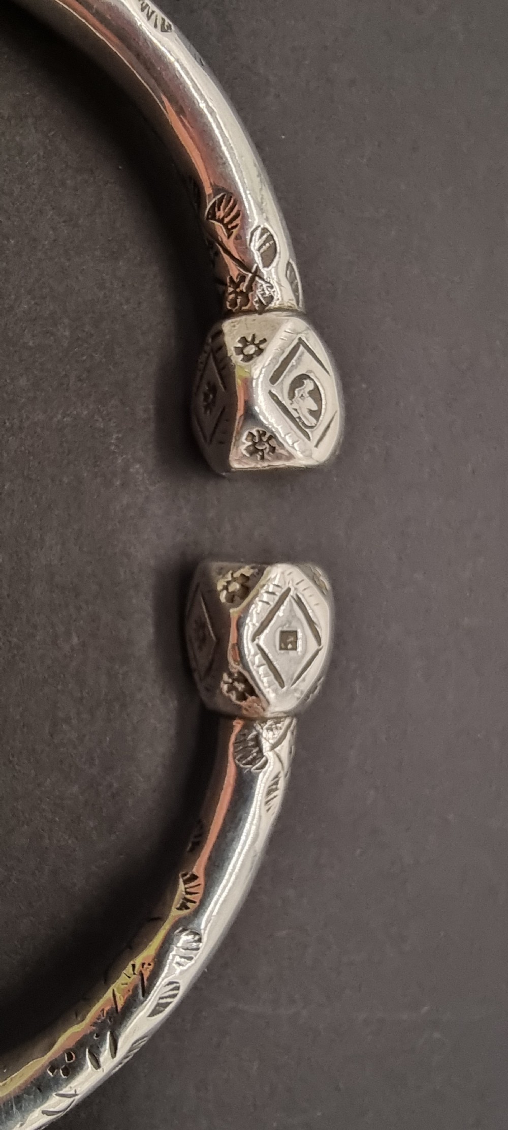 A very heavy pair of 19th century Portuguese solid silver arm bracelets

 View II