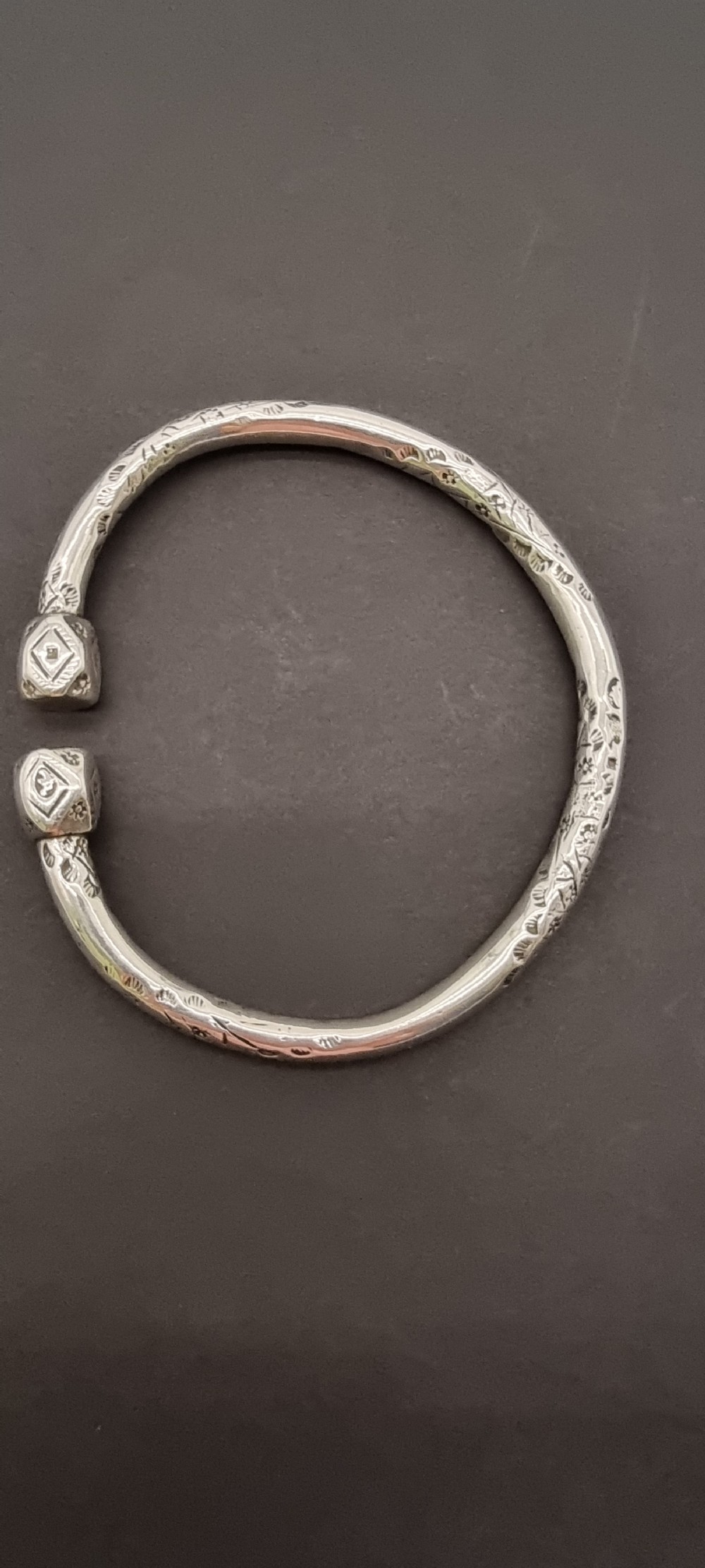 A very heavy pair of 19th century Portuguese solid silver arm bracelets

 View VI