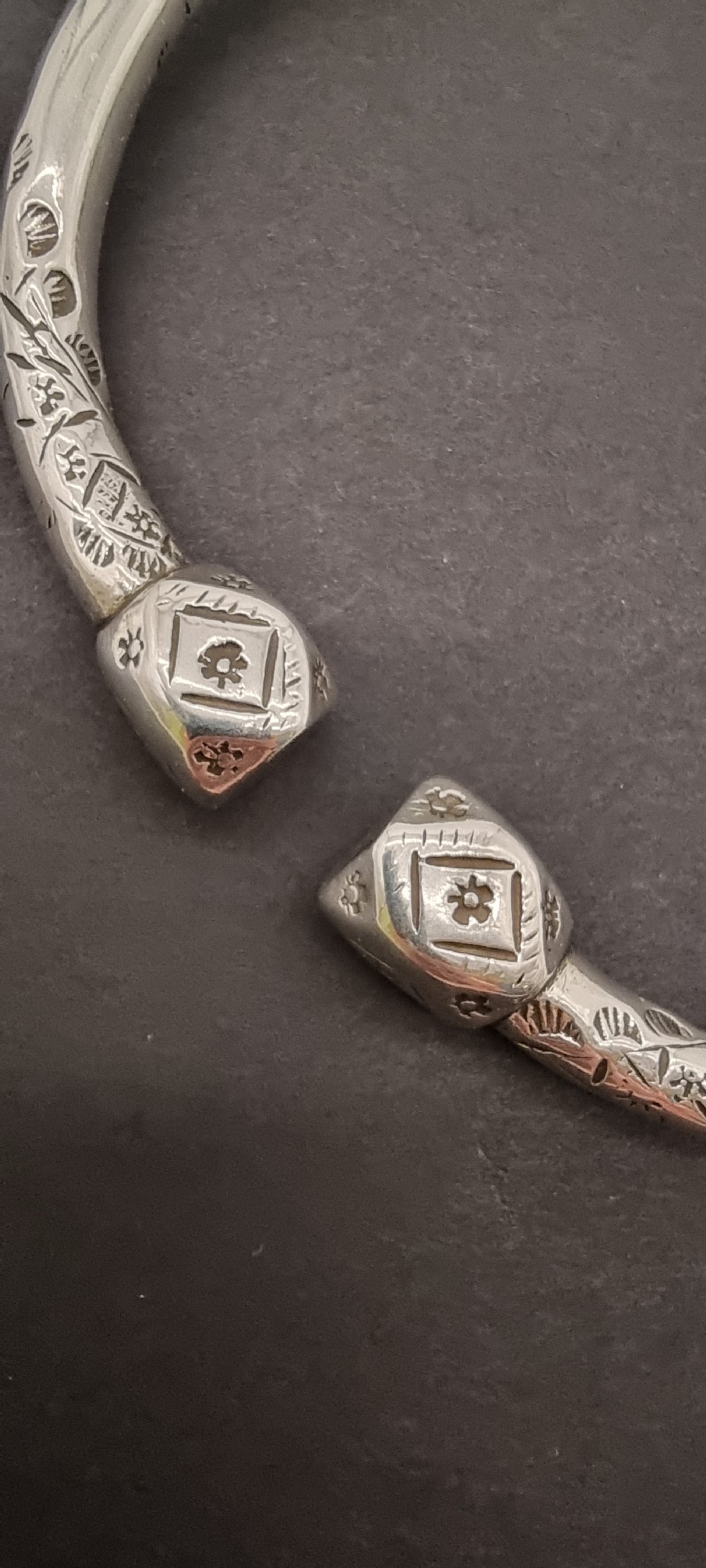 A very heavy pair of 19th century Portuguese solid silver arm bracelets

 View VII