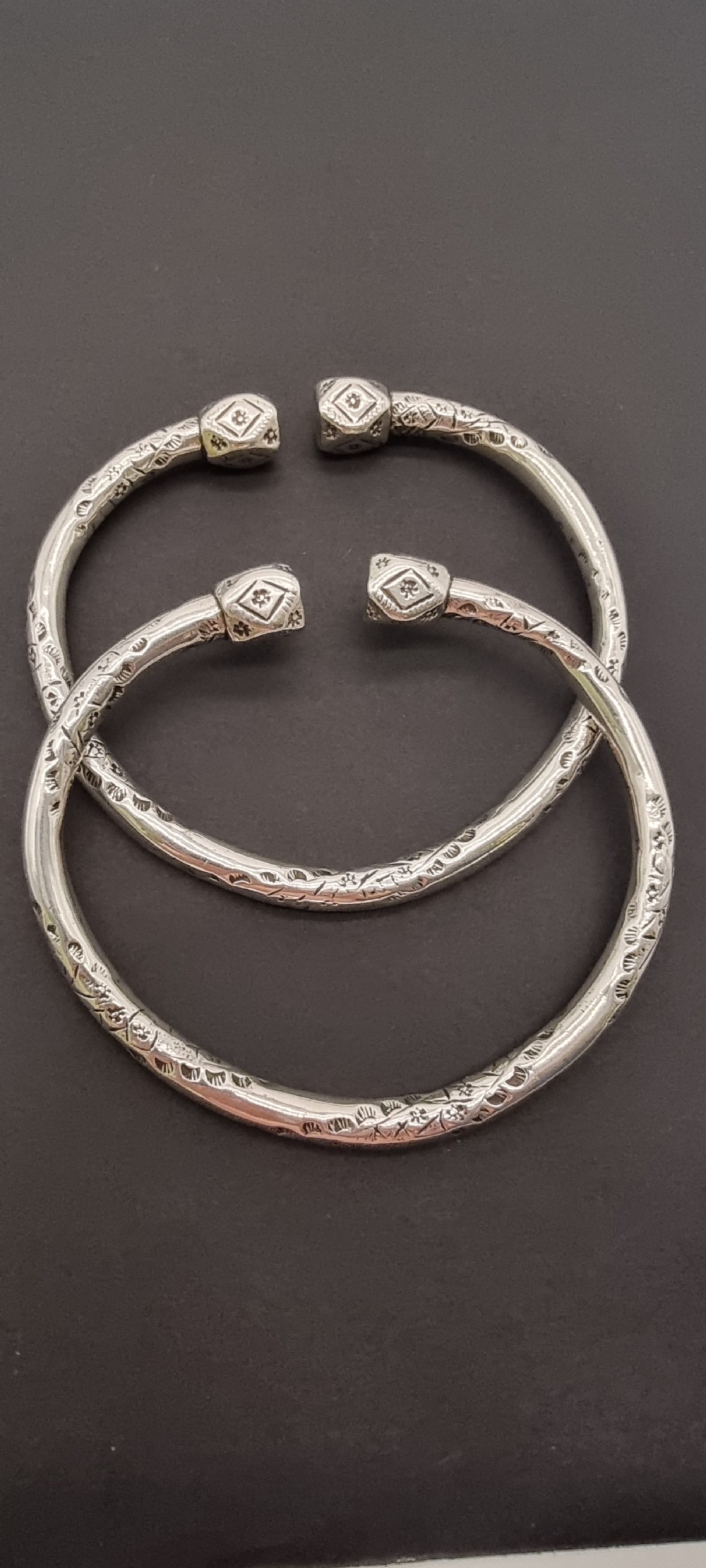 A very heavy pair of 19th century Portuguese solid silver arm bracelets

 View VIII