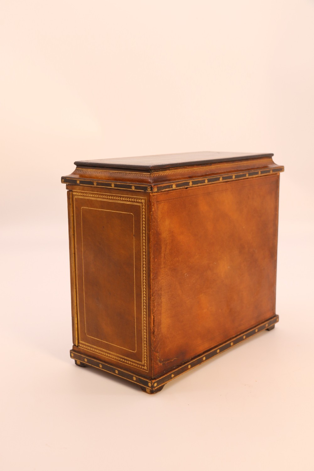 An Italian Grand Tour late 19th century jewellery cabinet finished in gilt tooled leather with a hand coloured view of The Royal Palace, Caserta Italy.

 View VI