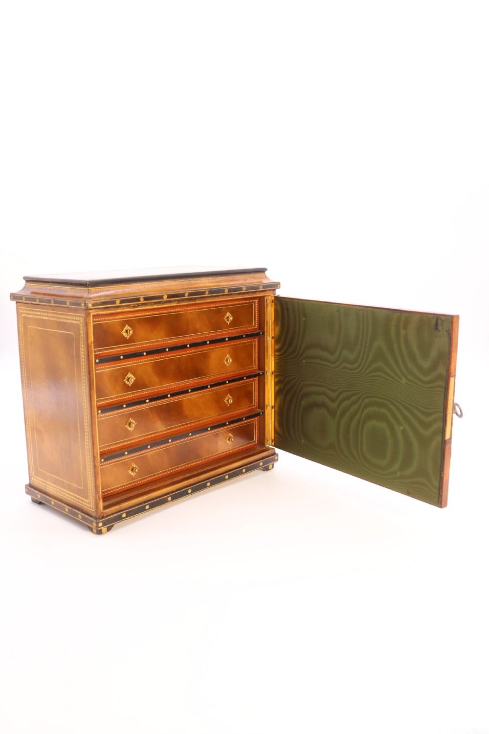 An Italian Grand Tour late 19th century jewellery cabinet finished in gilt tooled leather with a hand coloured view of The Royal Palace, Caserta Italy.

 View X