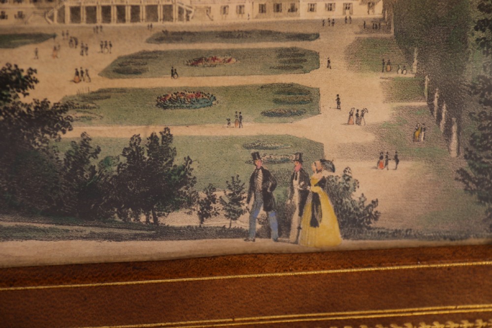 An Italian Grand Tour late 19th century jewellery cabinet finished in gilt tooled leather with a hand coloured view of The Royal Palace, Caserta Italy.

 View XXVII