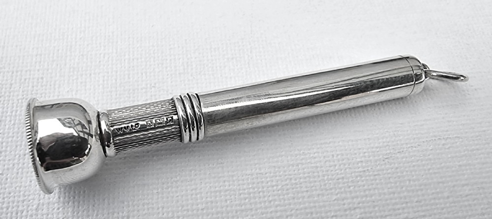 A rare silver cigar punch/cutter, Birmingham 1954/55 View II
