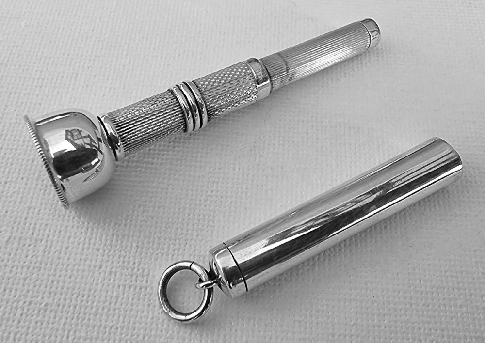 A rare silver cigar punch/cutter, Birmingham 1954/55 View VI