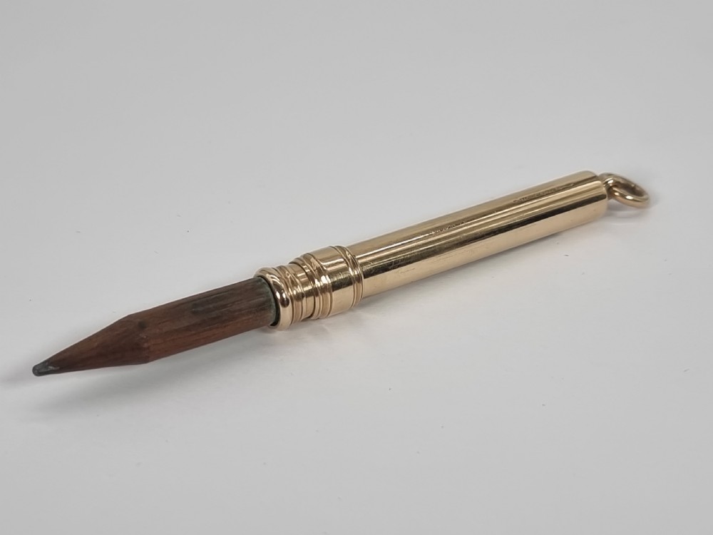 A late 19th century 10ct gold Mordan and Co. sliding fob pencil.