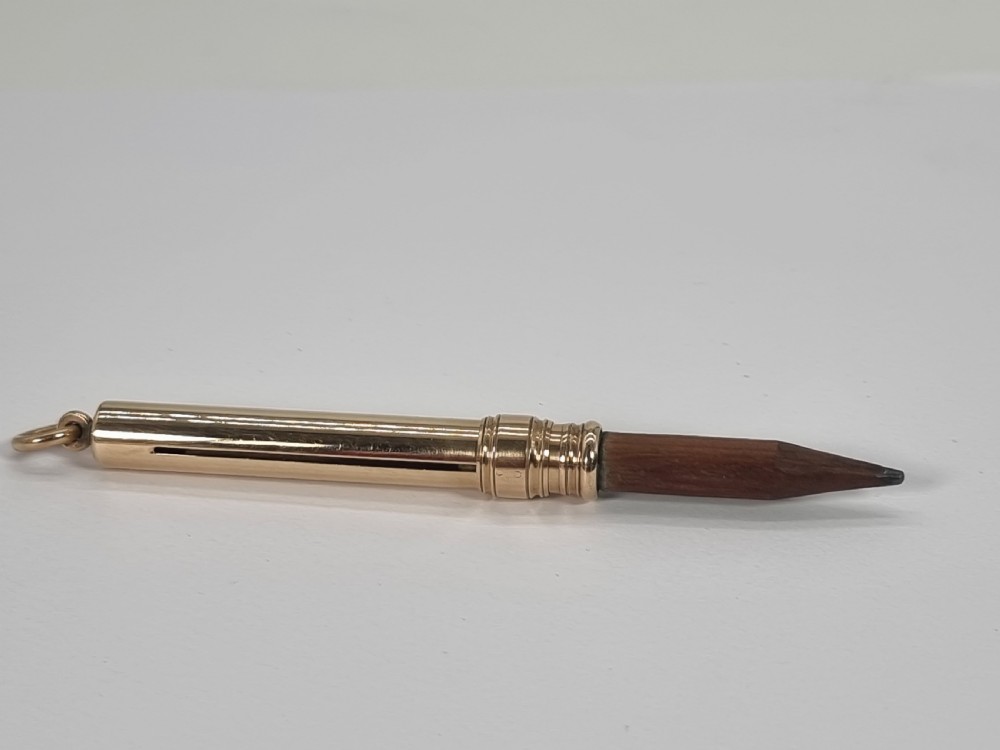 A late 19th century 10ct gold Mordan and Co. sliding fob pencil. View II