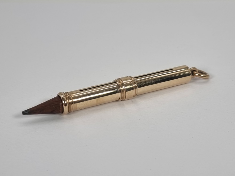 A late 19th century 10ct gold Mordan and Co. sliding fob pencil. View III