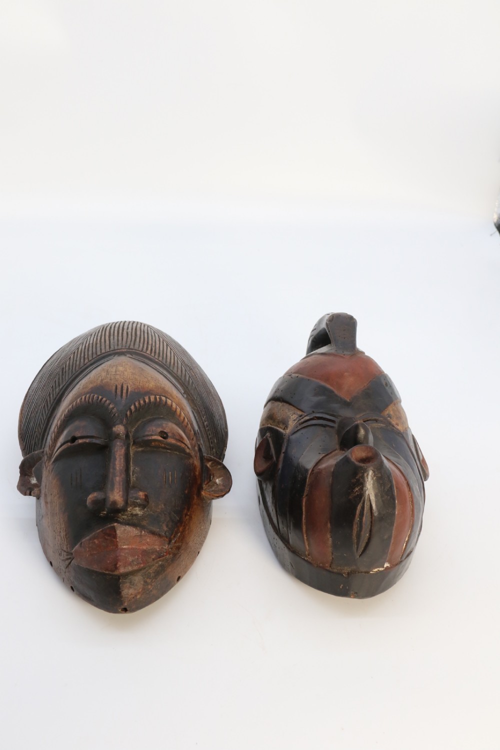 A matched pair of African tribal dance face masks, circa 1920 View IV