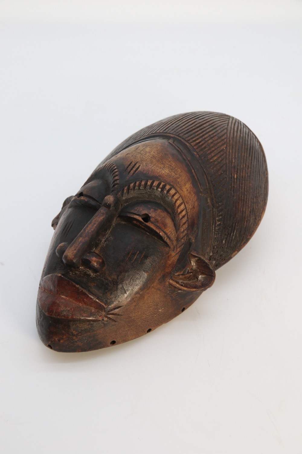 A matched pair of African tribal dance face masks, circa 1920 View V