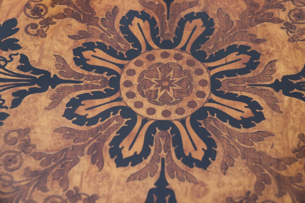 A rectangular mid-19th century satinwood centre table featuring detailed floral marquetry inlay across the tabletop, supported by carved barley twist legs and a central stretcher. View XXIII