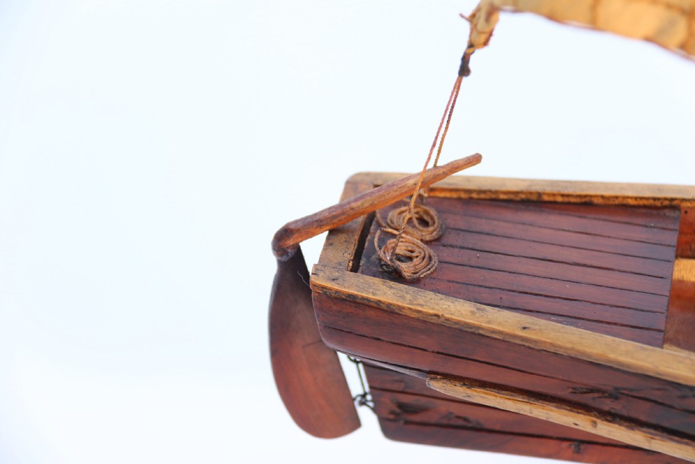 An English handmade yew wood model of an elegant 19th century sailing boat. View XIII