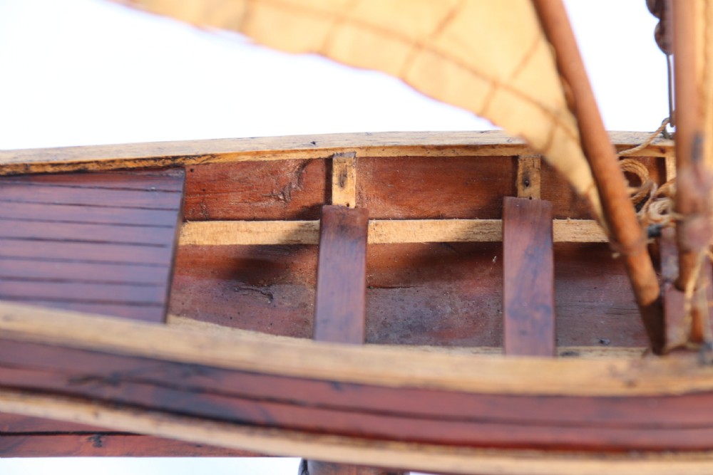 An English handmade yew wood model of an elegant 19th century sailing boat. View XIV