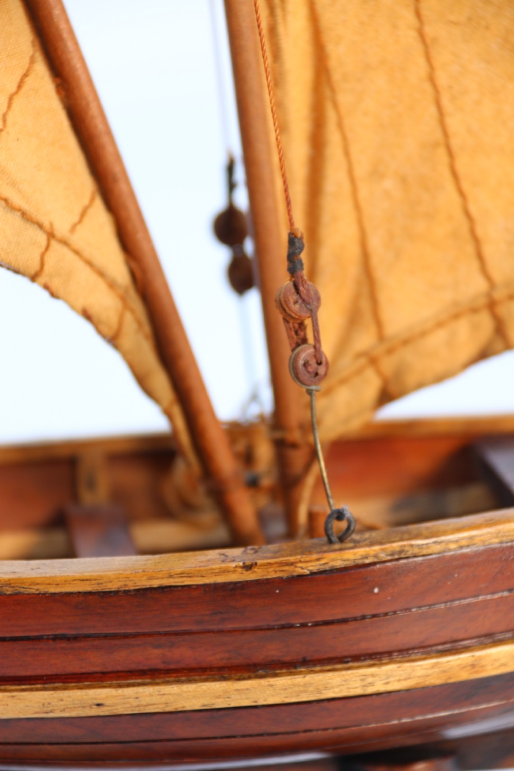 An English handmade yew wood model of an elegant 19th century sailing boat. View XVII