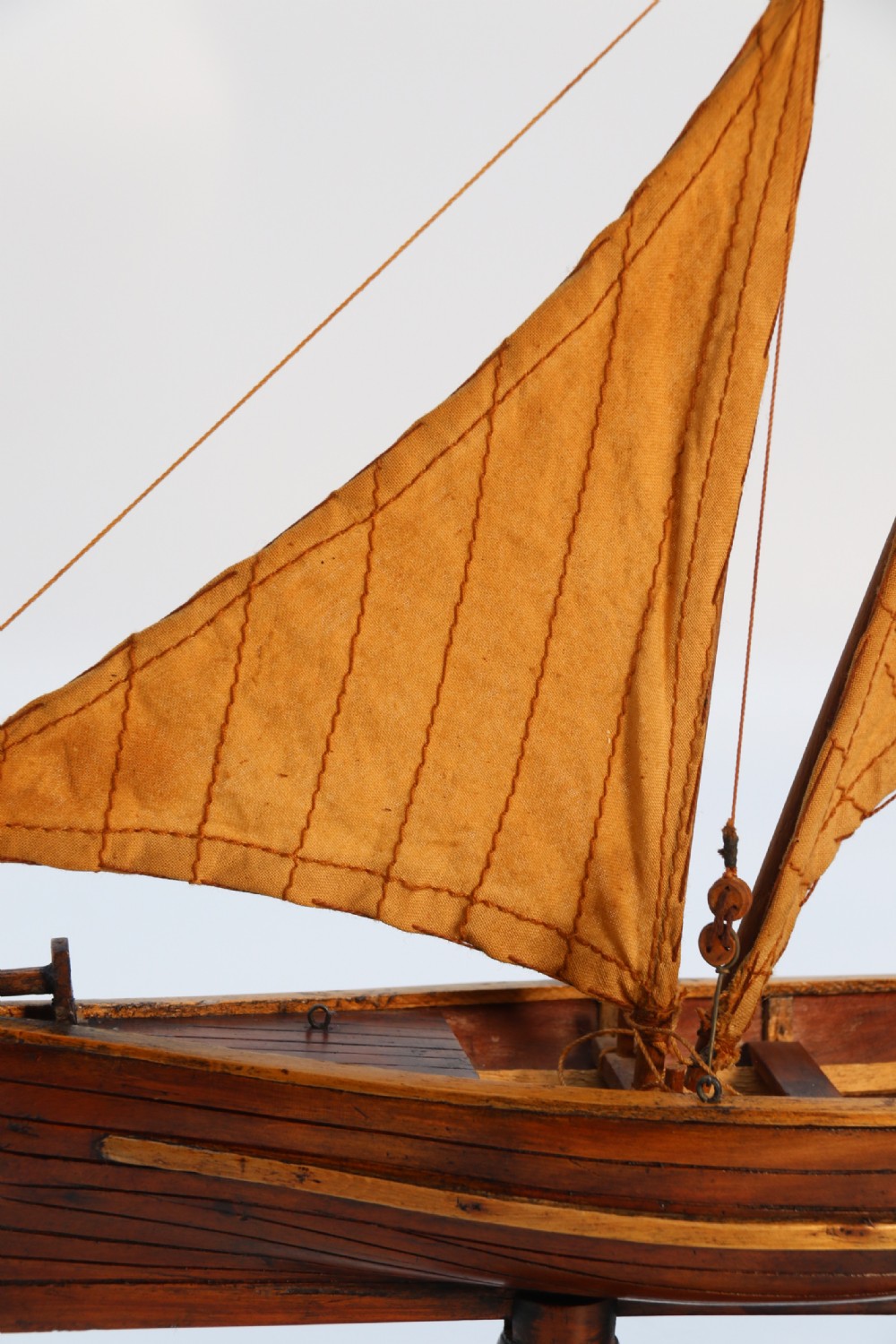 An English handmade yew wood model of an elegant 19th century sailing boat. View XVIII