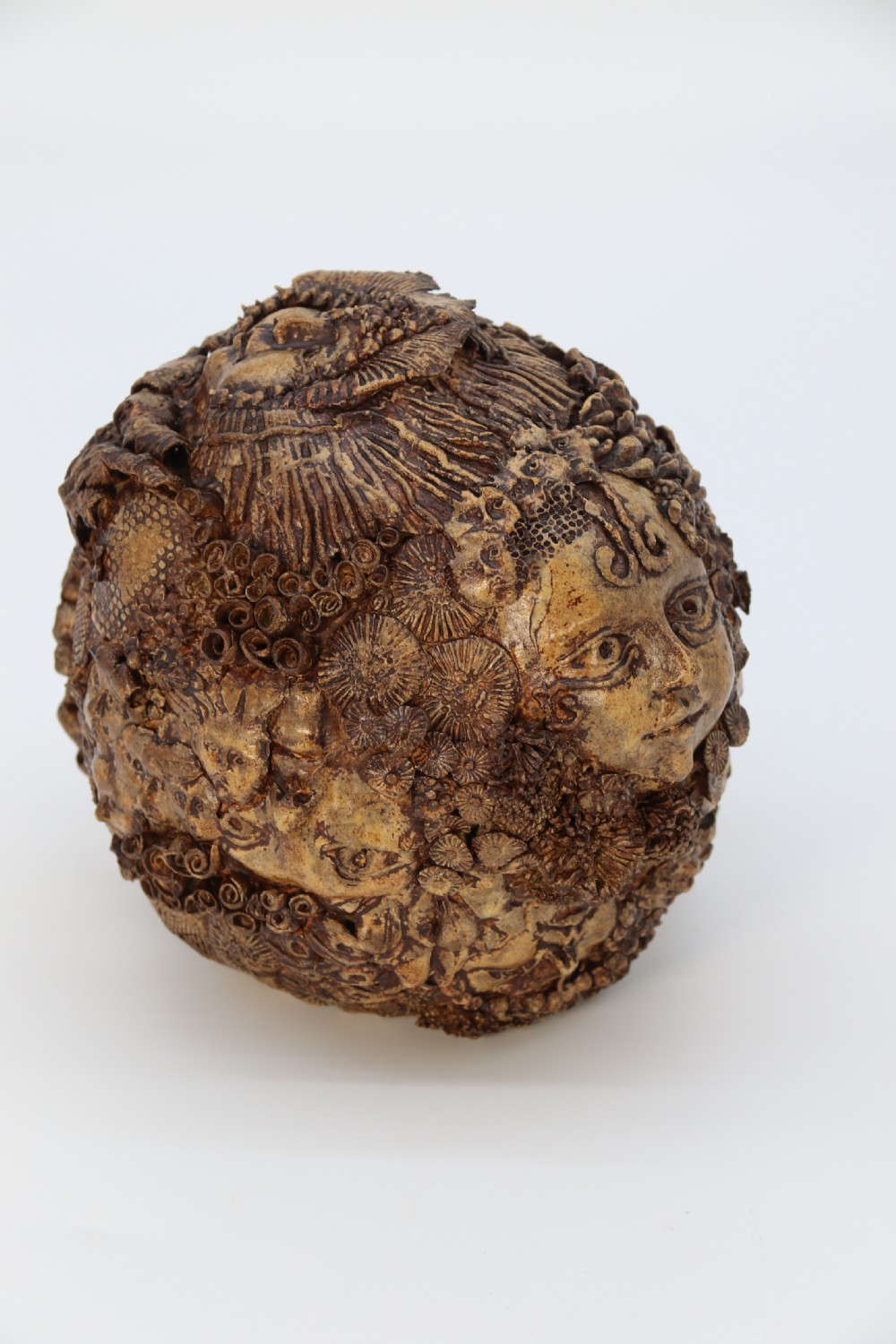 A rare studio pottery hand created mythical sculpture of the many faces of sea urchins. View VII