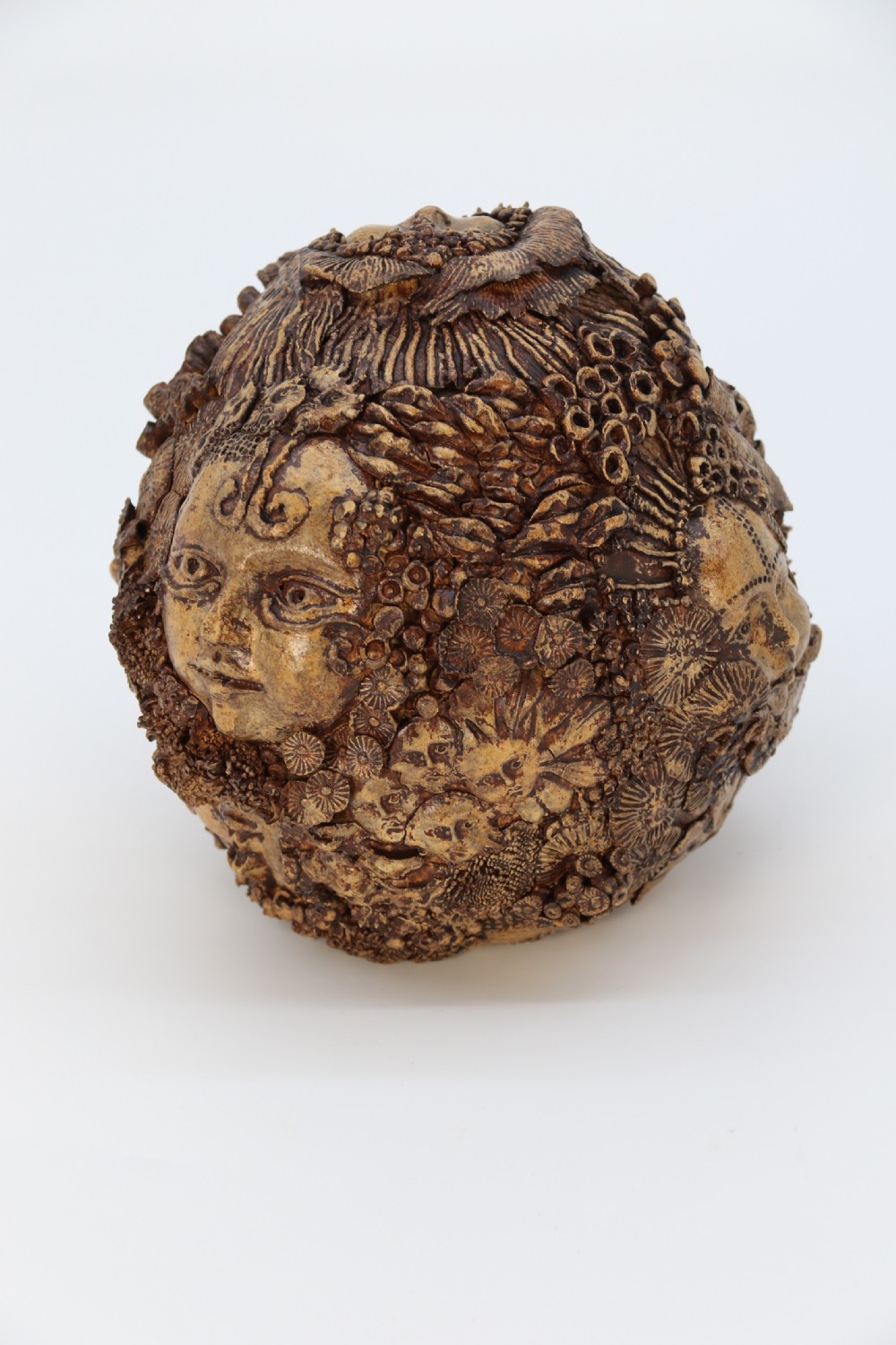 A rare studio pottery hand created mythical sculpture of the many faces of sea urchins. View VIII