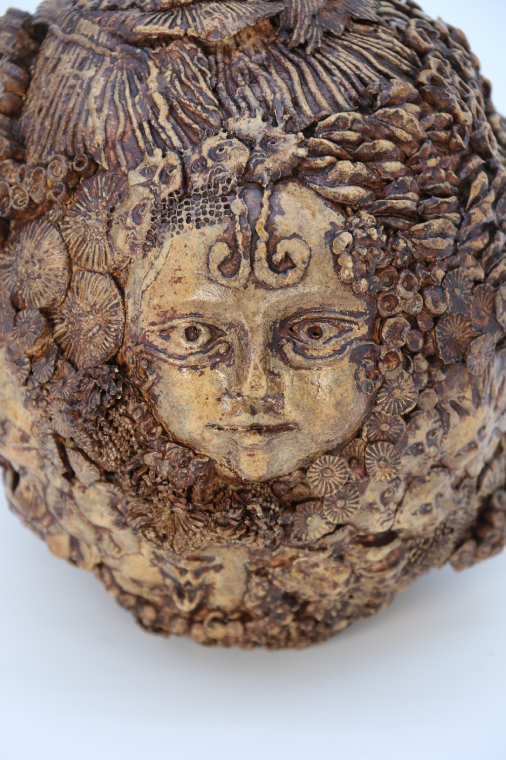 A rare studio pottery hand created mythical sculpture of the many faces of sea urchins. View IX