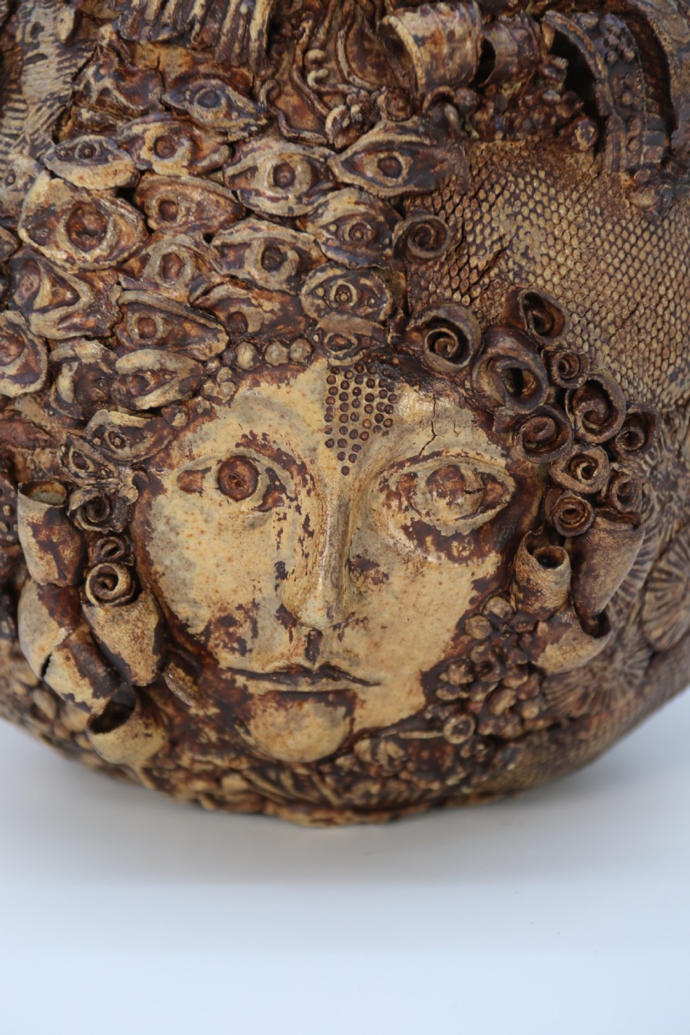 A rare studio pottery hand created mythical sculpture of the many faces of sea urchins. View XI