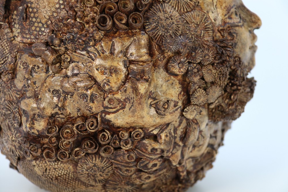 A rare studio pottery hand created mythical sculpture of the many faces of sea urchins. View XV