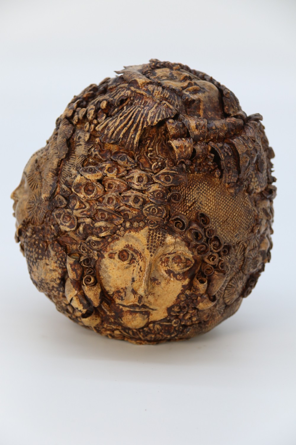 A rare studio pottery hand created mythical sculpture of the many faces of sea urchins. View XVI
