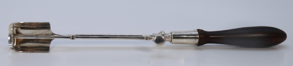 A Georgian style stilton cheese scoop finely made in heavy hall marked silver

 View II