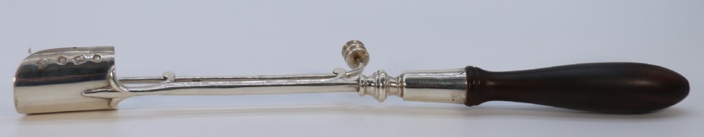 A Georgian style stilton cheese scoop finely made in heavy hall marked silver

 View IV