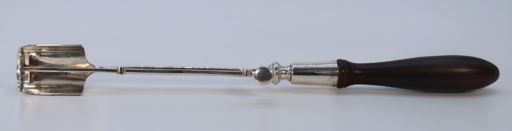 A Georgian style stilton cheese scoop finely made in heavy hall marked silver

 View V