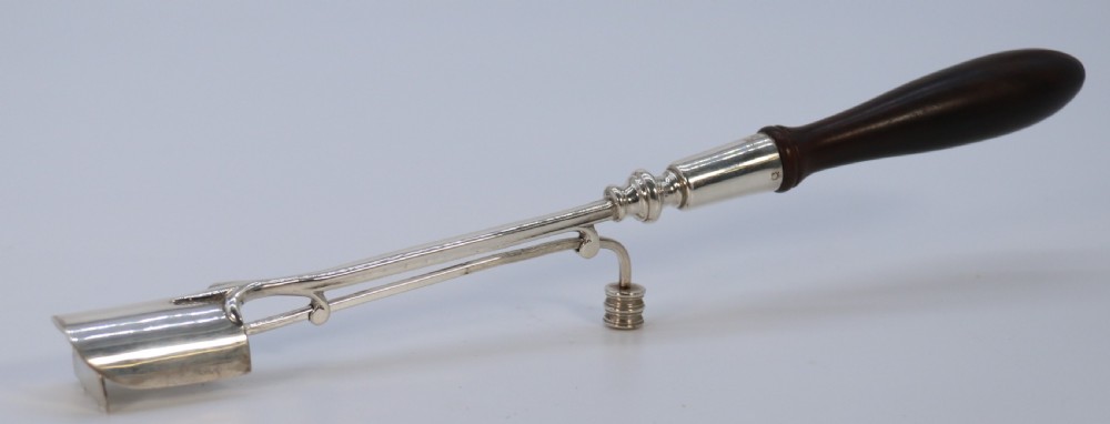 A Georgian style stilton cheese scoop finely made in heavy hall marked silver

 View VI