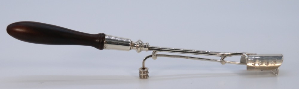 A Georgian style stilton cheese scoop finely made in heavy hall marked silver

 View VII
