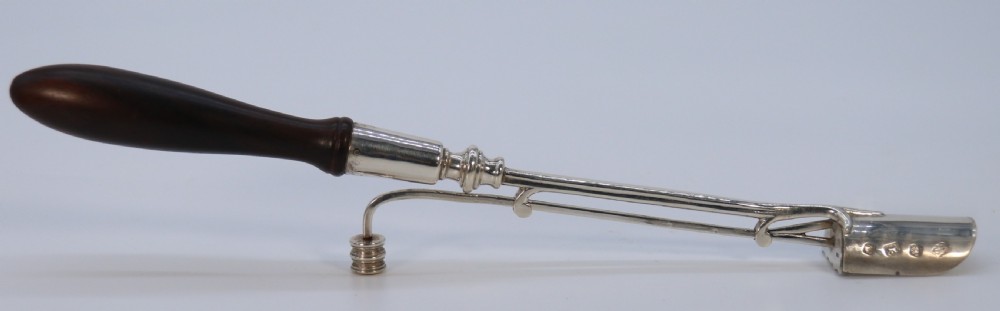 A Georgian style stilton cheese scoop finely made in heavy hall marked silver

 View VIII