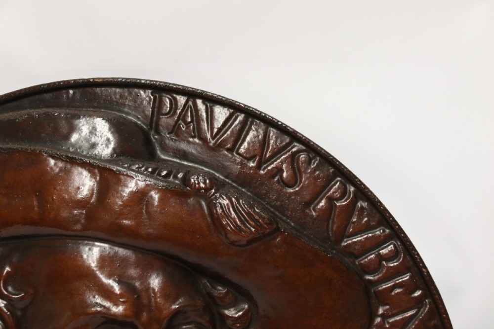 A matched pair of circular dark brown cast iron relief plaques featuring high-relief portrait busts of Peter Paul Rubens and William Shakespeare. View VIII