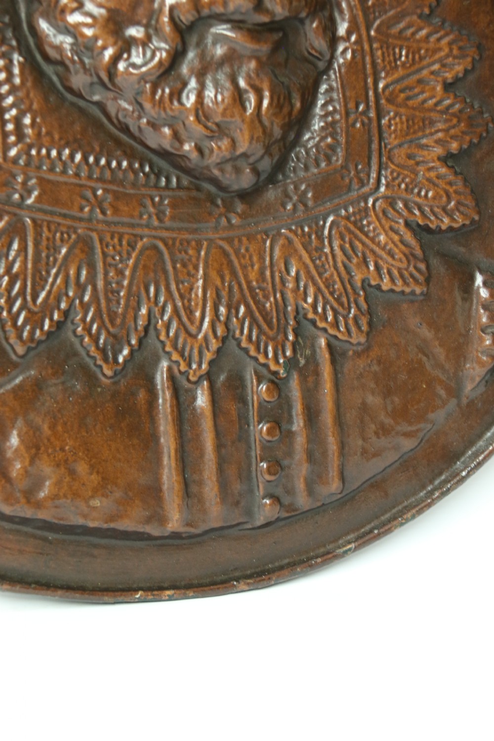 A matched pair of circular dark brown cast iron relief plaques featuring high-relief portrait busts of Peter Paul Rubens and William Shakespeare. View XV