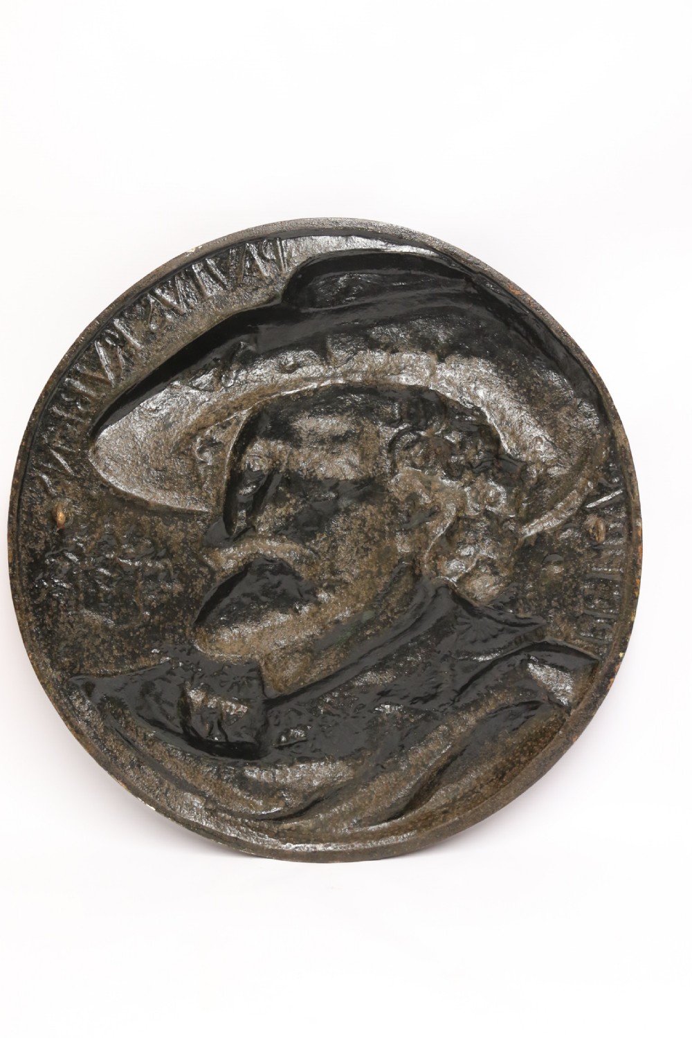 A matched pair of circular dark brown cast iron relief plaques featuring high-relief portrait busts of Peter Paul Rubens and William Shakespeare. View XVII