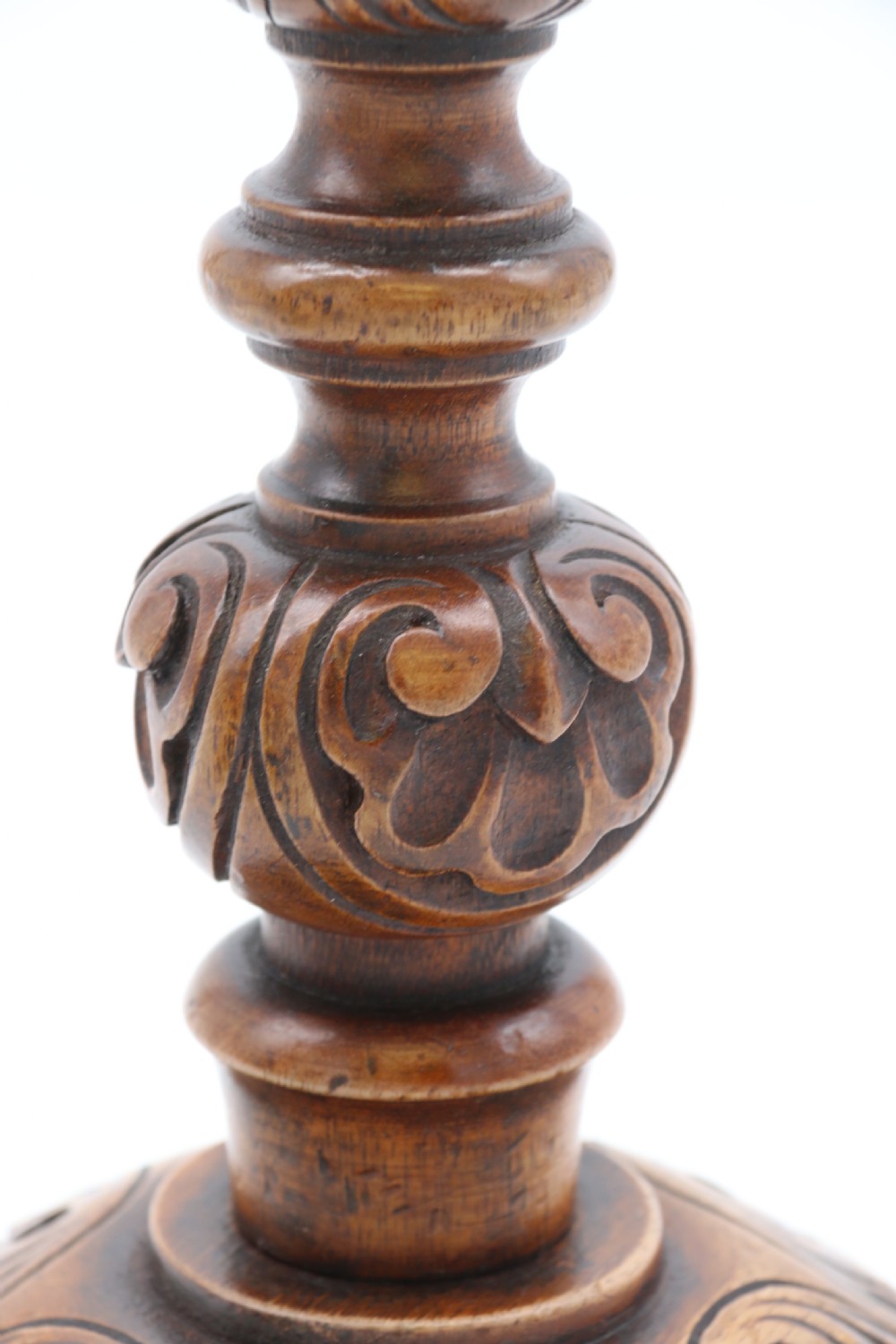 A large scale pair of English 19th century carved walnut and brass mounted candlesticks View XI