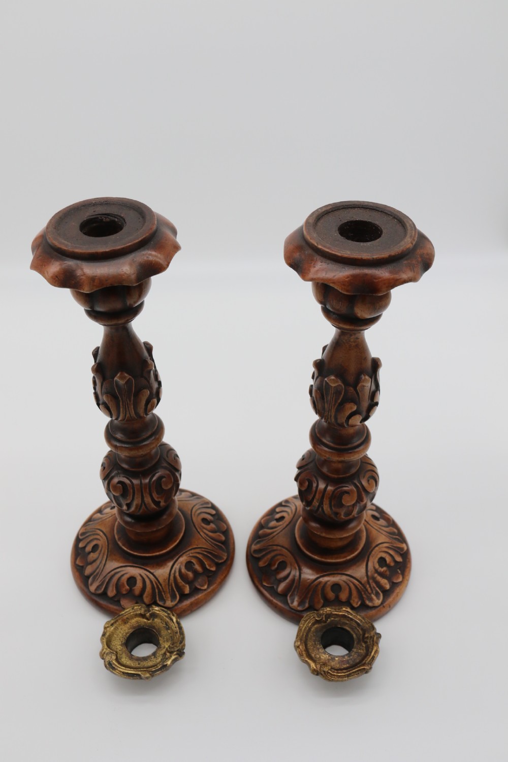 A large scale pair of English 19th century carved walnut and brass mounted candlesticks View XIV