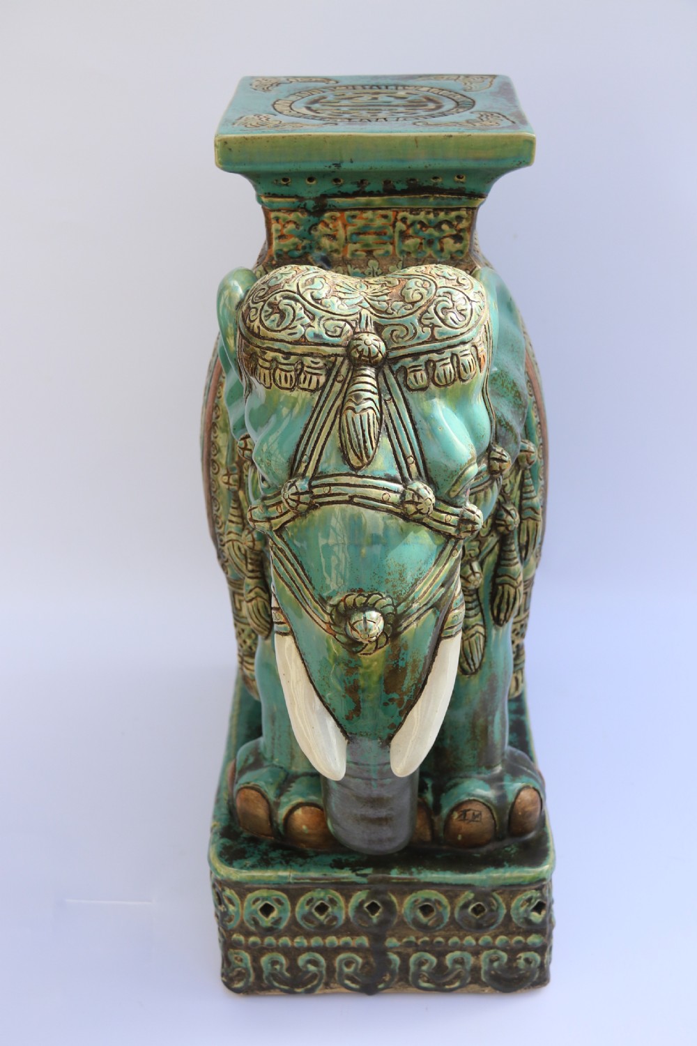 A large Chinese turquoise green pottery elephant display pedestal/stand. View III