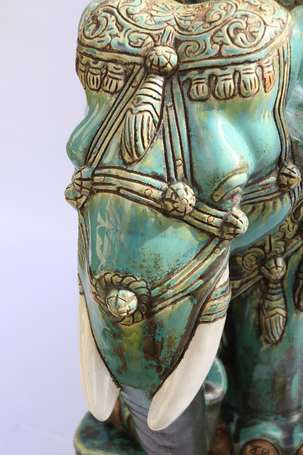 A large Chinese turquoise green pottery elephant display pedestal/stand. View IV