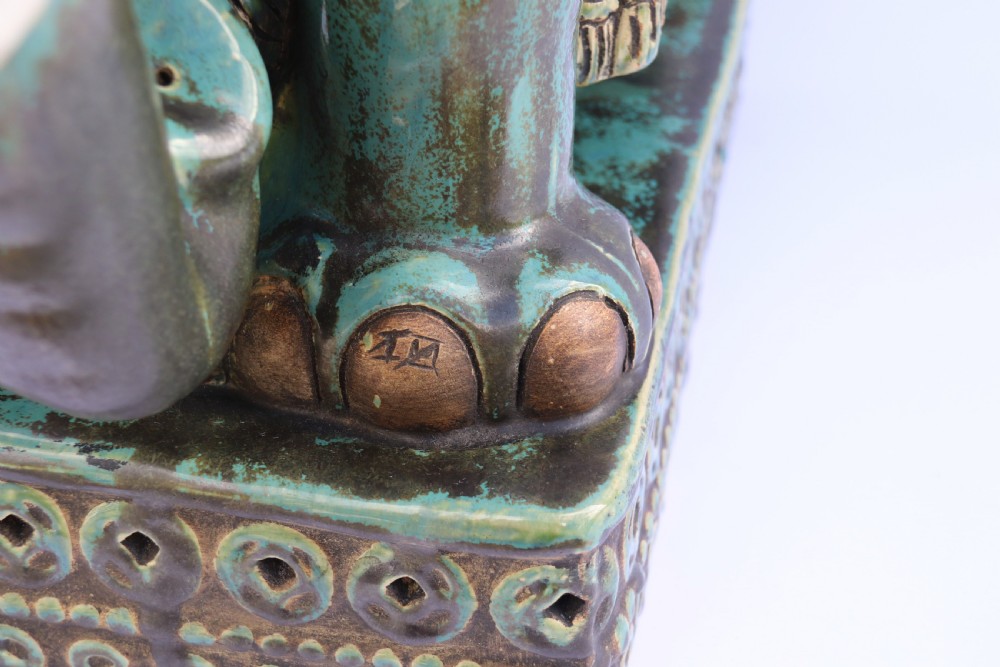 A large Chinese turquoise green pottery elephant display pedestal/stand. View V