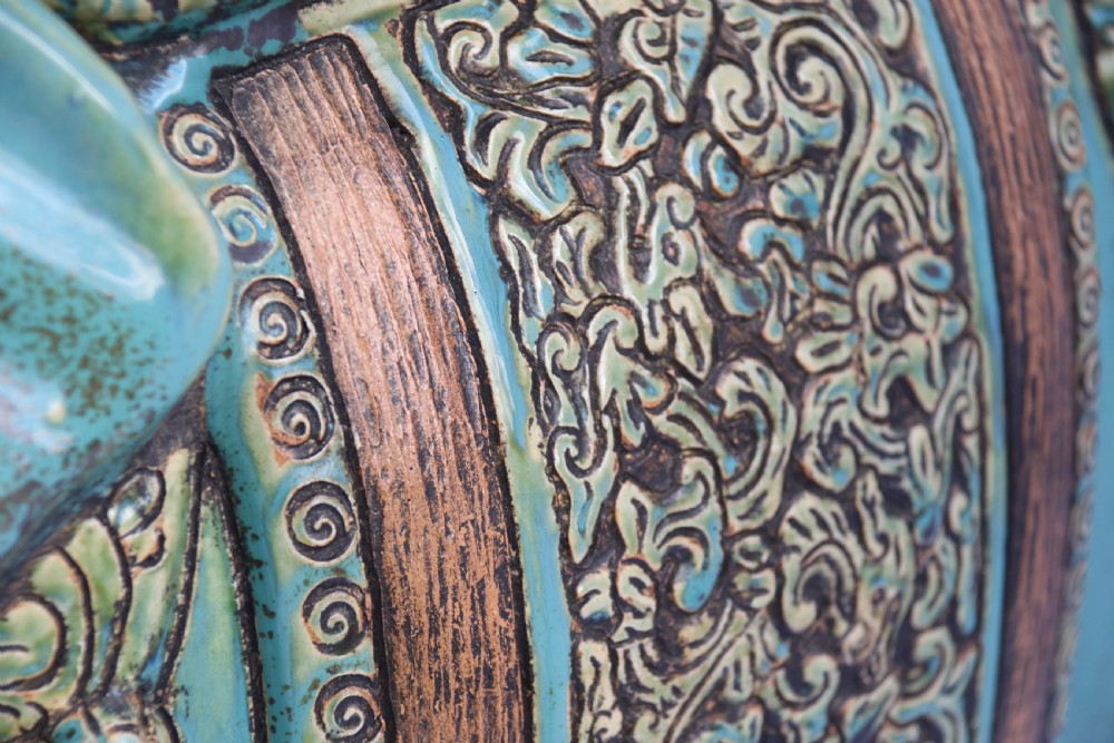 A large Chinese turquoise green pottery elephant display pedestal/stand. View VII
